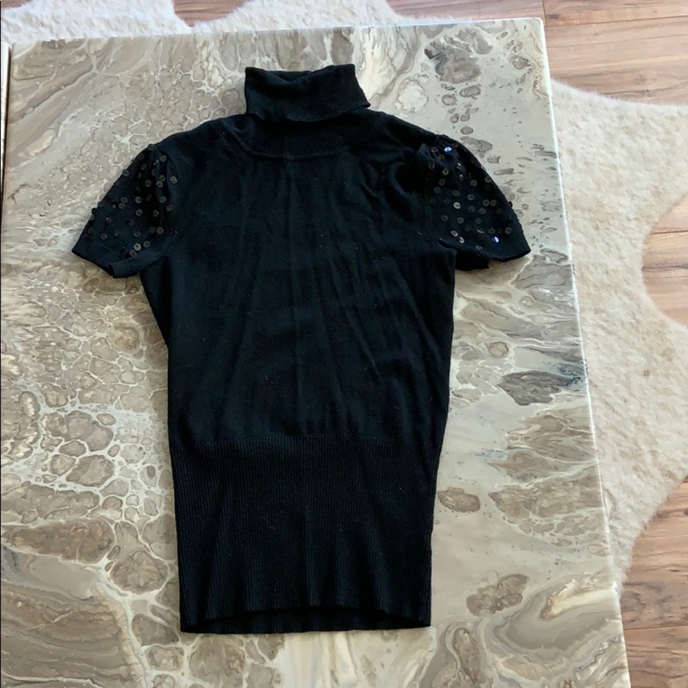 Black turtle neck with sequin sleeves